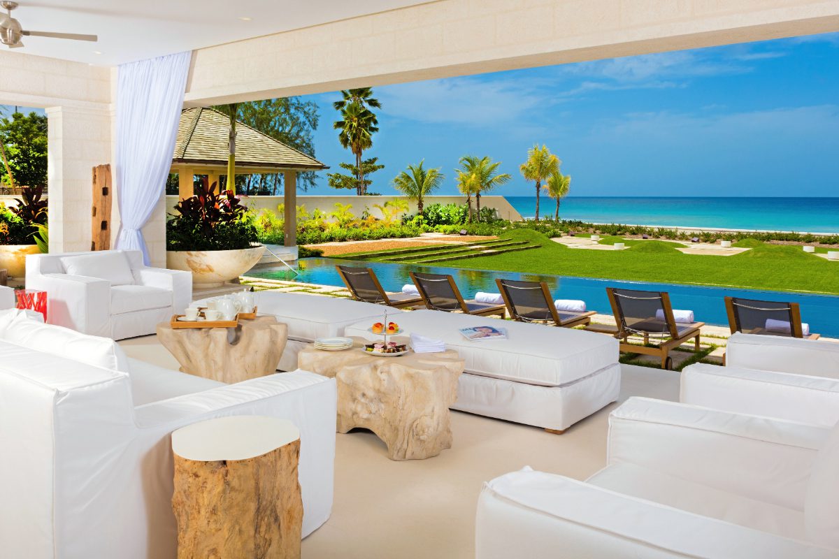 Outdoor lounging of Godings Beach House, a beachfront vacation rental in Barbados