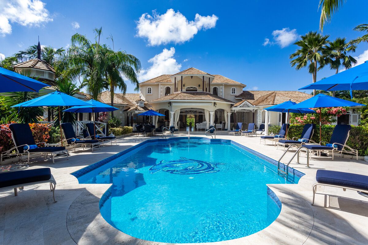 The view of the house over the poo. of Serenity, a luxury villa in Sandy Lane, Barbados.