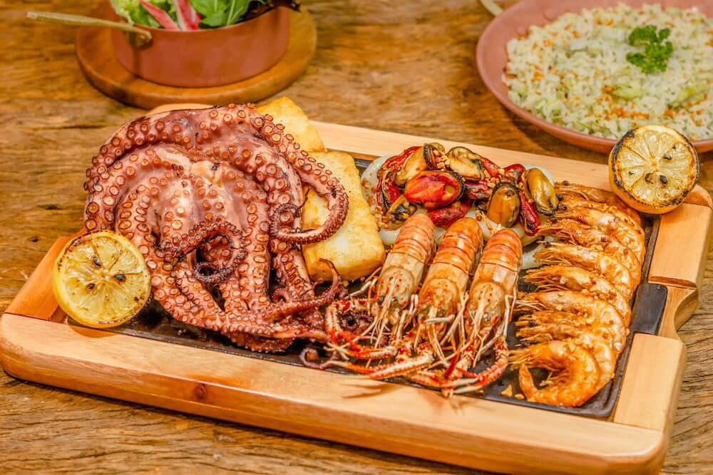 Fresh seafood, typically served at fine dining restaurants in Mykonos