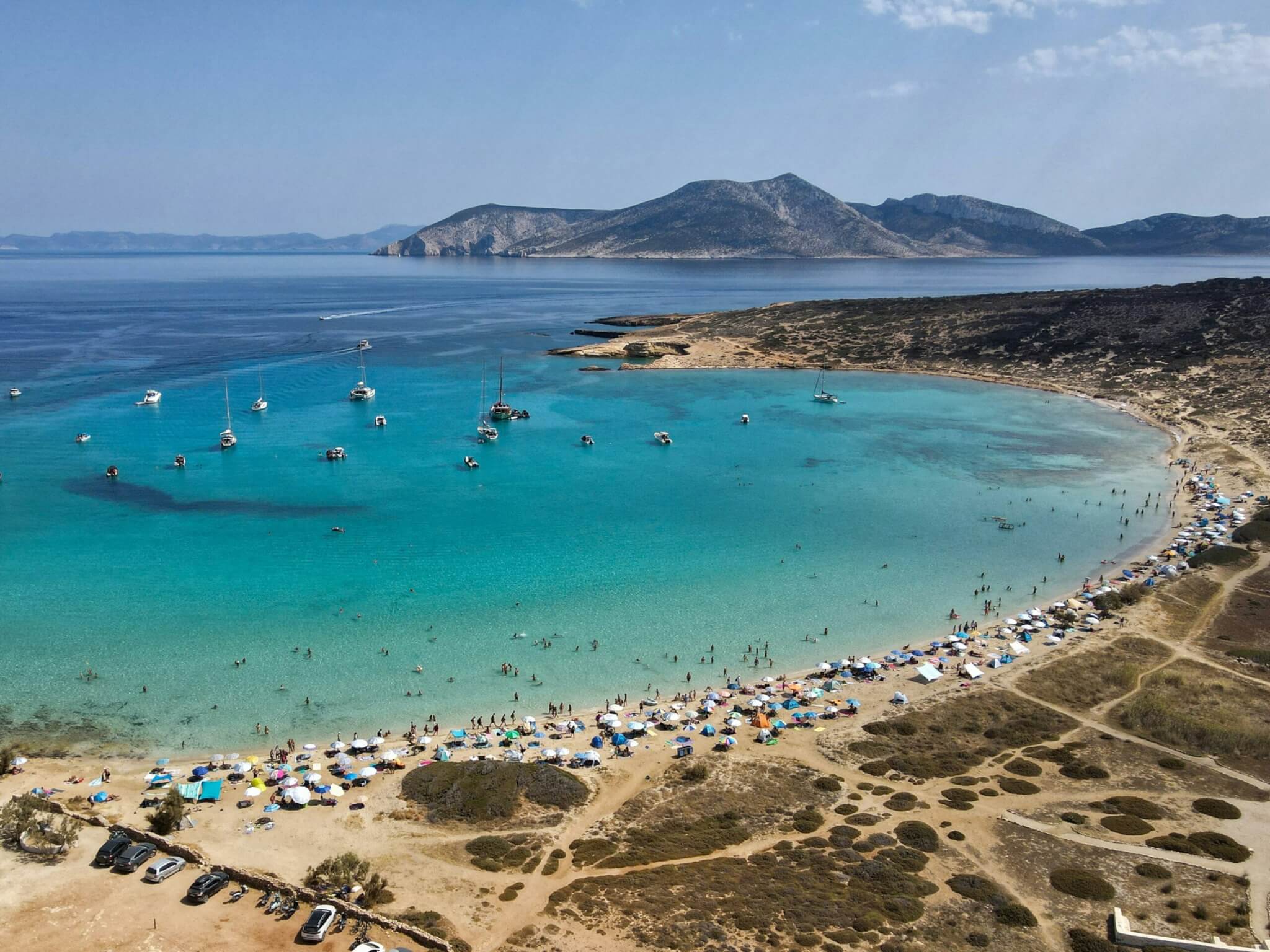 a cove with boats and people