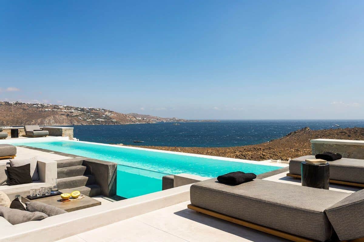 Villa Nadine, Mykonos — clifftop pool overlooking the Aegean
