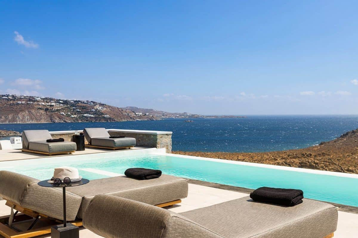Villa Nadine, Mykonos — clifftop pool overlooking the Aegean