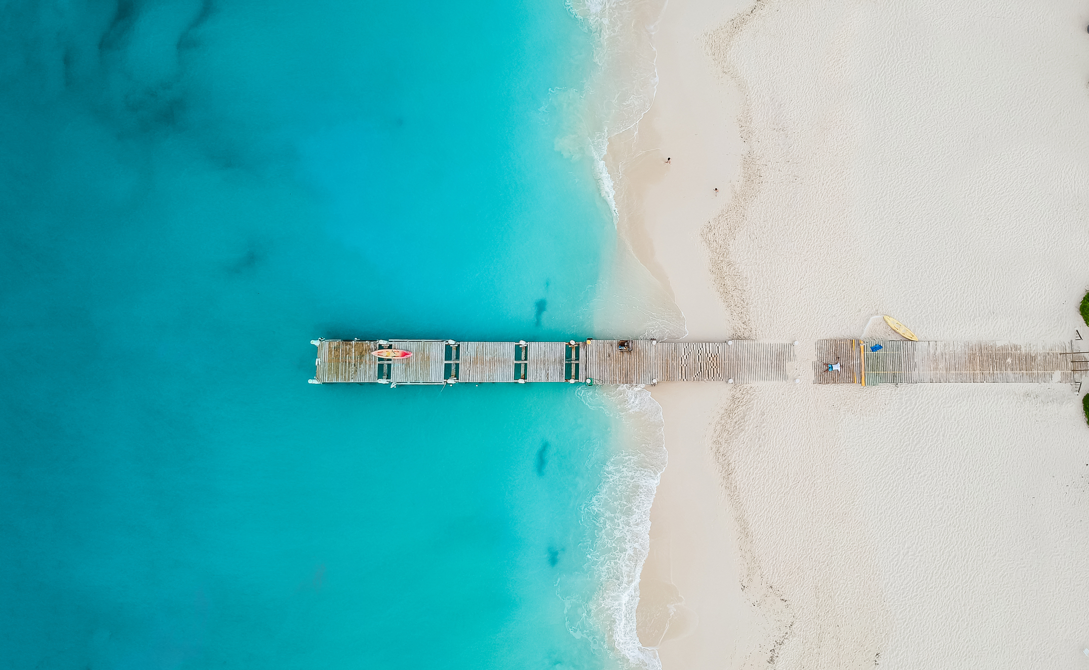 aerial view of the pier on Grace Bay beach, Turks and Caicos